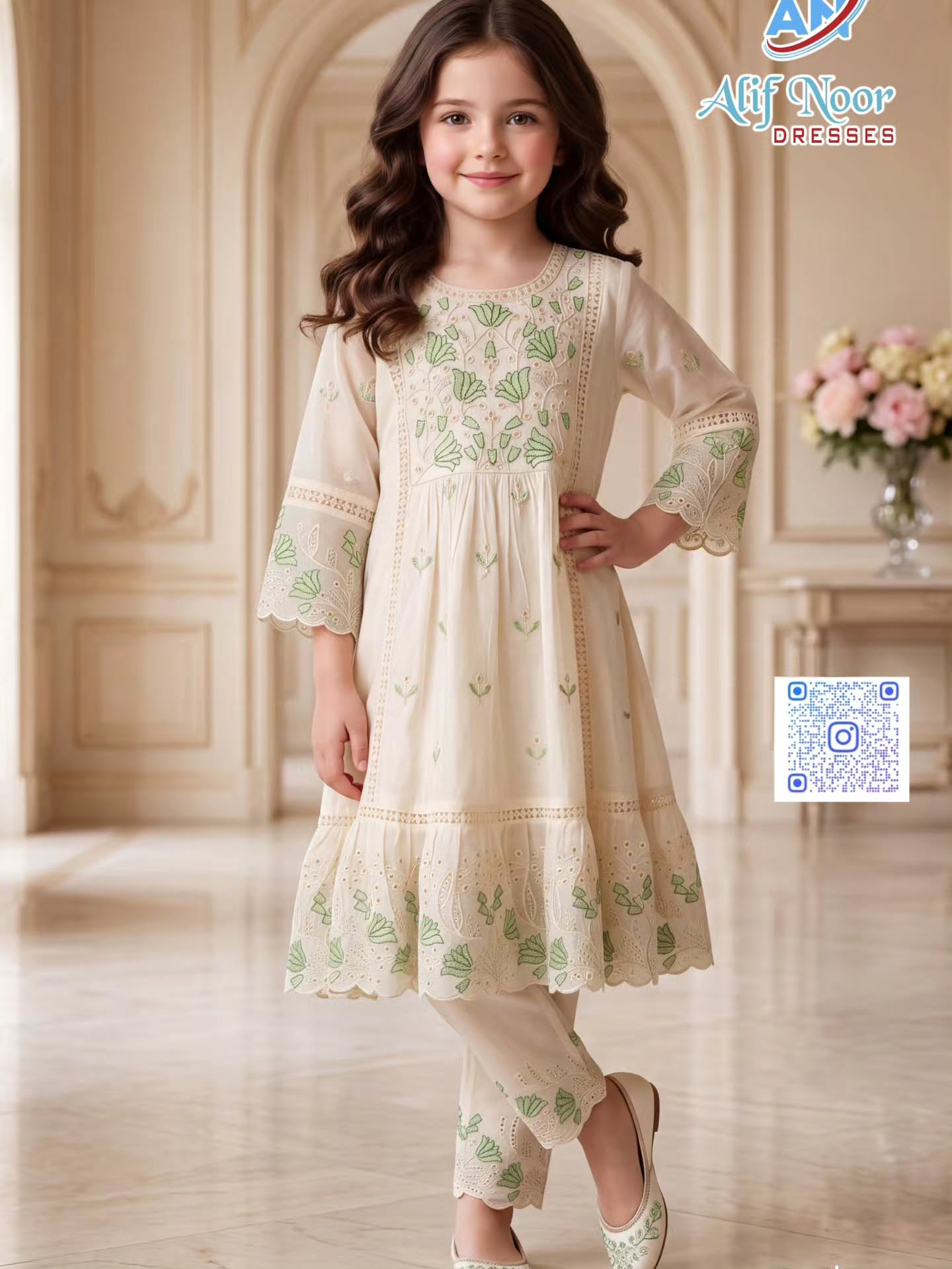 Girl wearing an ivory floral chikankari kurta set from Alif Noor Dresses